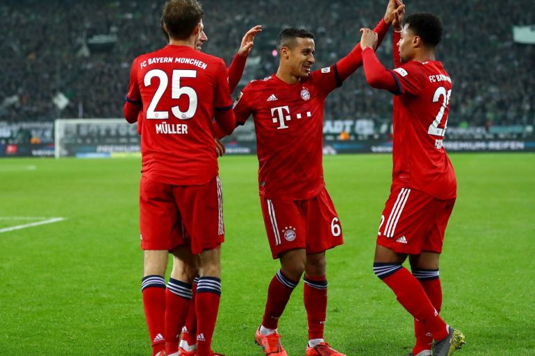 MOENCHENGLADBACH, GERMANY - MARCH 02: Serge Gnabry of Bayern MunSandro Wagner of Bayern Munich celebrates with teammates after scoring his team's fourth goal during the Bundesliga match between Borussia Moenchengladbach and FC Bayern Muenchen at Borussia-Park on March 02, 2019 in Moenchengladbach, Germany. (Photo by Maja Hitij/Bongarts/Getty Images)