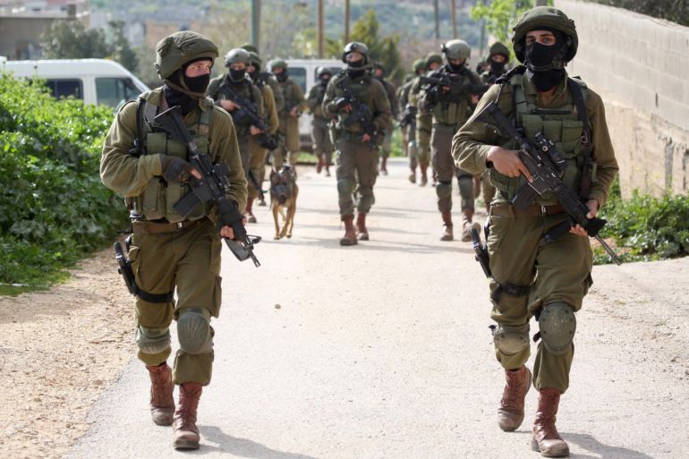 Shooting attack in the West Bank- - SALFIT, WEST BANK - MARCH 17: Israeli soldiers search the village of Bruqin, near the West Bank city of Salfit, after an Israeli was killed and two were wounded in a shooting attack near Ariel settlement in West Bank on March 17, 2019.