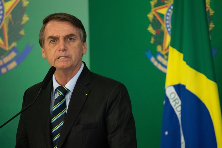 BRASILIA, BRAZIL - FEBRUARY 28: Brazilian President Jair Bolsonaro speaks with the press after meeting with venezuelan opposition leader and self-declared iterim president Juan Guaido at Palace Itamaraty on February 28, 2019 in Brasília, Brazil. (Photo by Andressa Anholete/Getty Images)