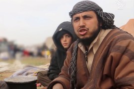 A man said to be an Islamic State militant, Abu Abd Al-Azeem, speaks in Baghouz, Syria in this still image taken from a video obtained by Reuters March 12, 2019. Social Media Website/ReutersTV via REUTERS ATTENTION EDITORS - THE VIDEO WAS PROVIDED BY A THIRD PARTY. THIS IMAGE CONTAINS USER GENERATED CONTENT THAT WAS UPLOADED TO A SOCIAL MEDIA WEBSITE. IT HAS BEEN CHECKED BY REUTERS' SOCIAL MEDIA TEAM AND REVIEWED BY A SENIOR EDITOR. REUTERS IS CONFIDENT THE EVENTS PORT