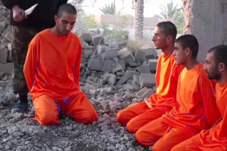 Ani Mosa, seen far right in the Isis video in which a captive was murdered, was spared and eventually released. ‘I went from death to life in 10 minutes,’ he said
