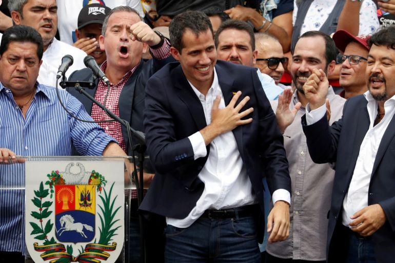 Venezuelan opposition leader Juan Guaido, who many nations have recognized as the country's rightful interim ruler, reacts during a rally held by his supporters against Venezuelan President Nicolas Maduro's government in Caracas, Venezuela March 4, 2019. REUTERS/Carlos Garcia Rawlins?