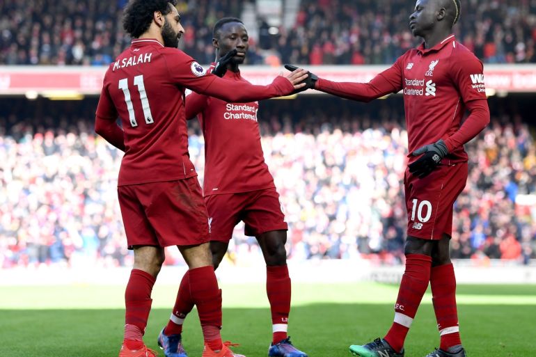 LIVERPOOL, ENGLAND - MARCH 10: Sadio Mane of Liverpool celebrates with his teammates after scoring his sides fourth goal during the Premier League match between Liverpool FC and Burnley FC at Anfield on March 10, 2019 in Liverpool, United Kingdom. (Photo by Michael Regan/Getty Images)
