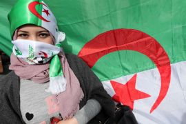 epa07415622 An Algerian student poses during a protest against the fifth term of Algerian President Abdelaziz Bouteflika in Algiers, Algeria, 05 March 2019. Bouteflika, serving as the president since 1999, submitted on 03 March his re-election candidacy papers to the Constitutional Council, despite the mystery surrounding his health status as well as continuing protests against his plans to seek a fifth term in office. EPA-EFE/MOHAMED MESSARA