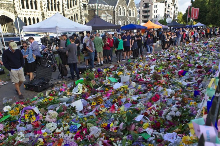 Tribute to victims of twin terror attacks in New Zealand- - CHRISTCHURCH, NEW ZEALAND - MARCH 19: Hundreds of people pay tribute to the victims of the mosque attack at botanic garden memorial, in Christchurch, New Zealand on March 19, 2019. At least 50 people were reportedly killed in twin terror attacks targeting mosques in Christchurch, New Zealand, an official said on Friday. Witnesses claim the Al Noor Mosque was targeted by armed assailants and there were up to 200