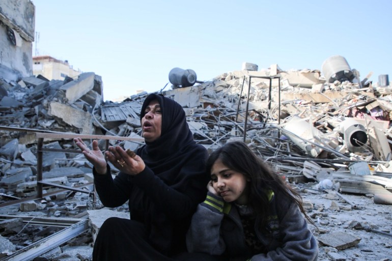 Israel continues to pound Gaza despite ceasefire- - GAZA CITY, GAZA - MARCH 26: A resident, Nahi Alhwyty reacts at wreckage of Hassona building after Israeli warplanes carried out airstrike towards the building in Rimal neighbourhood of Gaza City, Gaza on March 26, 2019.