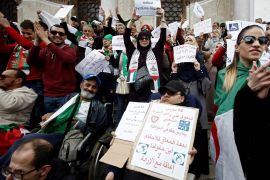 People with special needs, accompanied by their families, take part in a protest demanding immediate political change and improvement of their living conditions in Algiers, Algeria March 14, 2019. REUTERS/Ramzi Boudina