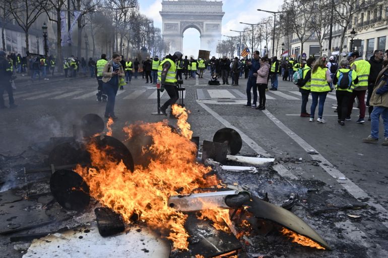 18th Yellow vest demonstration in Paris- - PARIS, FRANCE - MARCH 16: Yellow vests (Gilets jaunes) protesters stage a demonstration on avenue Champs Elysees in Paris, France on March 17, 2019.
