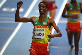 BIRMINGHAM, ENGLAND - MARCH 04: Yomif Kejelcha of Ethiopia celebrates winning the Men's 3000m Final during Day Four of the IAAF World Indoor Championships at Arena Birmingham on March 4, 2018 in Birmingham, England. (Photo by Tony Marshall/Getty Images)