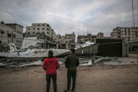 epa07438318 Palestinians inspect a destroyed Hamas site after an Israeli airstrike in Gaza City, 15 March 2019. The Israeli military said that it carried out strikes in Gaza in response to earlier rocket fire from the Palestinian enclave. At least one of the rockets fired from Gaza landed in Tel Aviv. EPA-EFE/MOHAMMED SABER