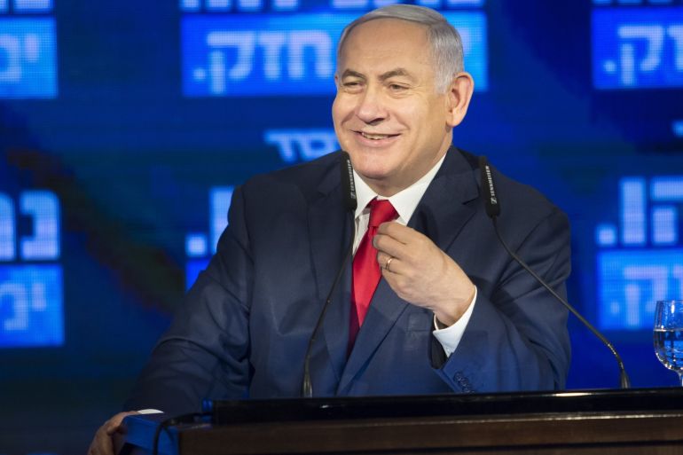 RAMAT GAN, ISRAEL - MARCH 04: Israel's Prime Minster Benjamin Netanyahu smiles as he delivers a speech during the launch of the Likud party election campaign on March 4, 2019 in Ramat Gan, Israel. (Photo by Amir Levy/Getty Images)