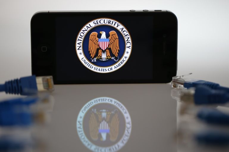 An illustration picture shows the logo of the U.S. National Security Agency on the display of an iPhone in Berlin, June 7, 2013. The debate over whether the U.S. government is violating citizens' privacy rights while trying to protect them from terrorism escalated dramatically on Thursday amid reports that authorities have collected data on millions of phone users and tapped into servers at nine internet companies. REUTERS/Pawel Kopczynski (GERMANY - Tags: POLITICS