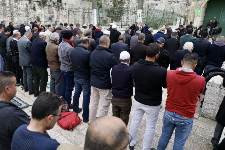 Palestinians perform prayer at Bab al-Asbat- - JERUSALEM - MARCH 12: Palestinians perform prayer at Bab al-Asbat (Lions' Gate) after Israeli forces have closed several entrances to East Jerusalem’s flashpoint Al-Aqsa Mosque complex amid ongoing clashes with Palestinian worshippers, in Jerusalem on March 12, 2019.