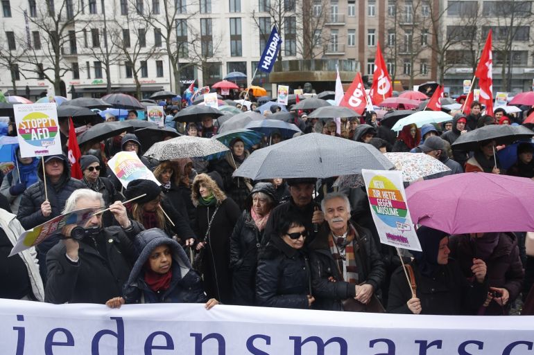 Protest against racism in Berlin- - BERLIN, GERMANY - MARCH 16: People stage a demonstration against twin terror attacks targeting mosques in Christchurch and racism in Berlin, Germany on March 16, 2019.