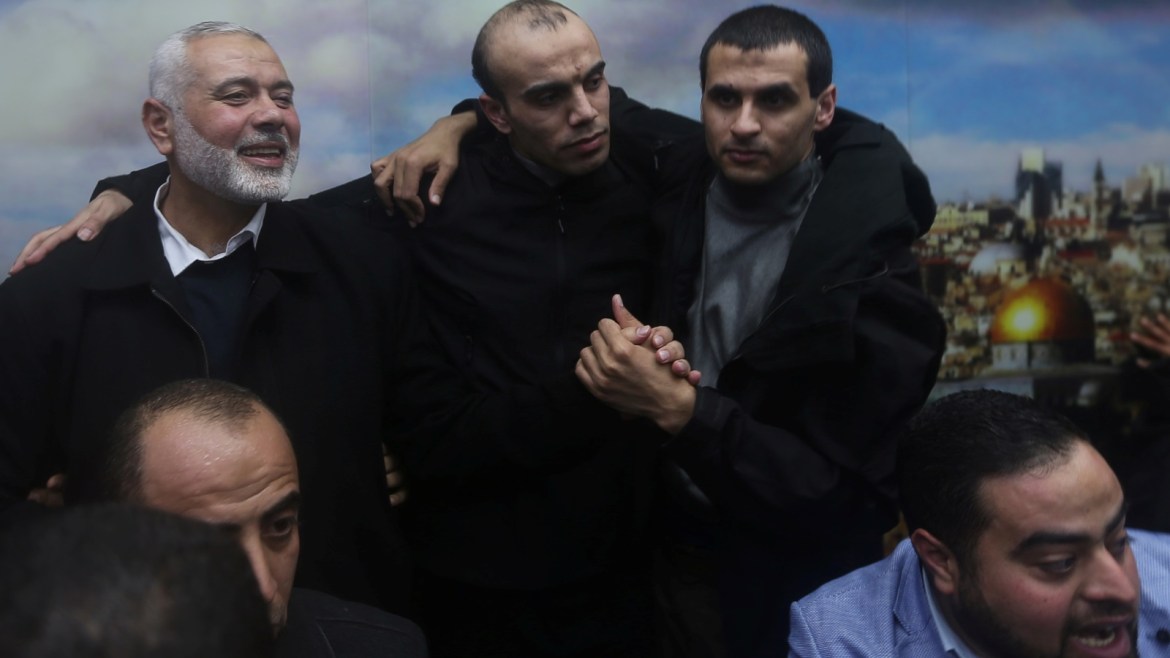 Palestinian Hamas Chief Ismail Haniyeh welcomes Hamas members who went missing in Egypt a few years ago, after their arrival in Gaza City February 28, 2019. REUTERS/Ibraheem Abu Mustafa