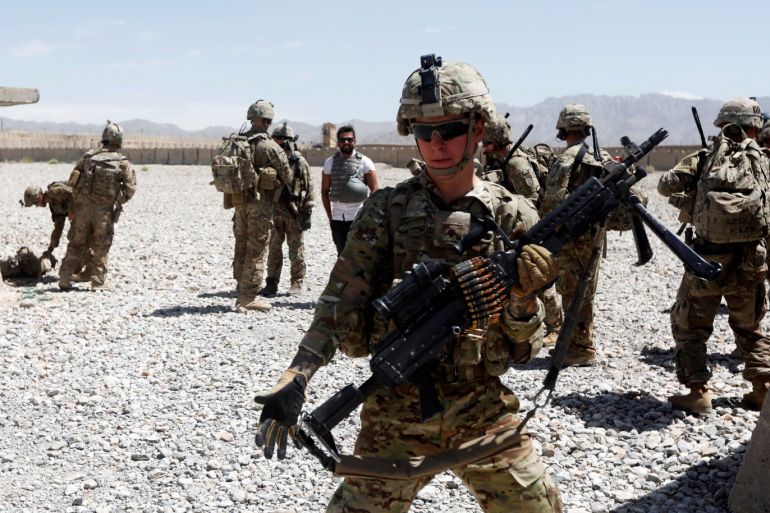 U.S. troops wait for their helicopter flight at an Afghan National Army (ANA) Base in Logar province, Afghanistan August 7, 2018. REUTERS/Omar Sobhani