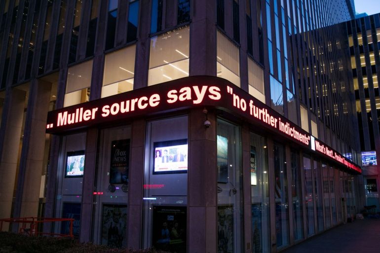 NEW YORK, NY - MARCH 22: The news ticker outside the news Corp. building displays the latest about the Robert Muller's investigation into the Trump campaign's alleged collusion with Russia on March 22, 2019 in New York, New York. Muller filed his report with the U.S. Attorney General after a 22-month investigation. Kevin Hagen/Getty Images/AFP== FOR NEWSPAPERS, INTERNET, TELCOS & TELEVISION USE ONLY ==
