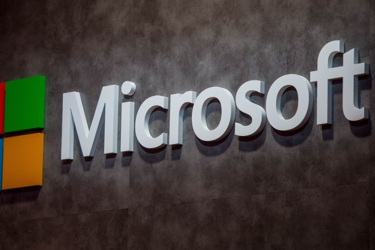 BARCELONA, SPAIN - FEBRUARY 22: A logo sits illuminated outside the Microsoft pavilion on the opening day of the World Mobile Congress at the Fira Gran Via Complex on February 22, 2016 in Barcelona, Spain. The annual Mobile World Congress hosts some of the world's largest communications companies, with many unveiling their latest phones and wearables gadgets. (Photo by David Ramos/Getty Images)