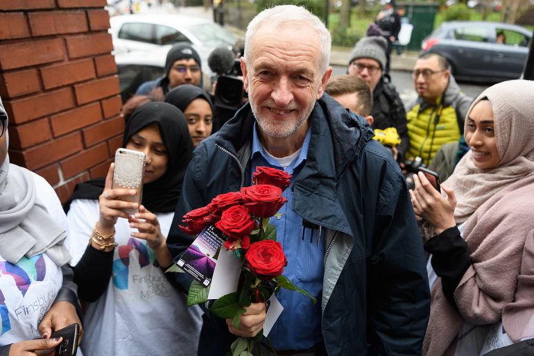 LONDON, ENGLAND - MARCH 03: Labour Party leader Jeremy Corbyn is presented with red roses as he visits Finsbury Park mosque on "Visit Your Mosque Day", on March 03, 2019 in London, England. A man was killed near the mosque during an attack by far right extremist Darren Osborne in June 2017. (Photo by Leon Neal/Getty Images)