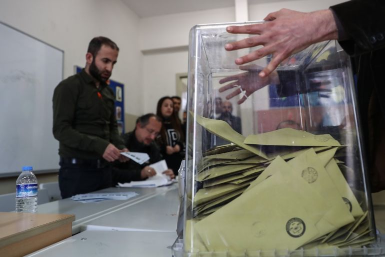 Turkish local polls: Voting ends in all provinces- - ISTANBUL, TURKEY - MARCH 31: Scrutineers count votes after the polls for the local elections closed at a polling station in Istanbul, Turkey on March 31, 2019. The voting ended for local elections in all 81 provinces across Turkey at 5 p.m. local time (1400GMT) on Sunday. Turkey is holding its first local elections under the new presidential system, adopted in the April 2017 referendum.