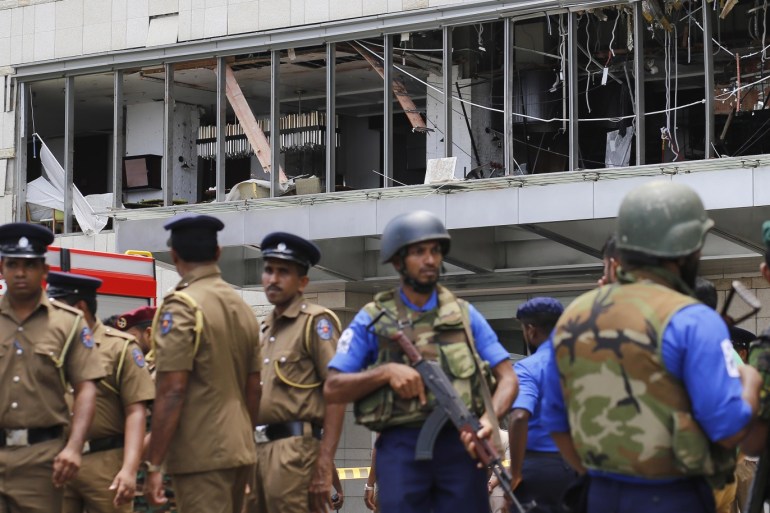 epa07519448 Police and security personnel stand gaurd after an explosion hit Shangri-La Hotel in Colombo, Sri Lanka, 21 April 2019. According to news reports at least 138 people killed and over 400 injured in a series of blasts during the Easter Sunday service at St Anthony's Church in Kochchikade, Shangri-La Hotel and Kingsbury Hotel with many more places. EPA-EFE/M.A. PUSHPA KUMARA