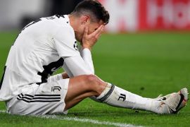 TURIN, ITALY - APRIL 16: Christiano Ronaldo of Juventus sits with his head in the hands during the UEFA Champions League Quarter Final second leg match between Juventus and Ajax at Allianz Stadium on April 16, 2019 in Turin, Italy. (Photo by Stuart Franklin/Getty Images)