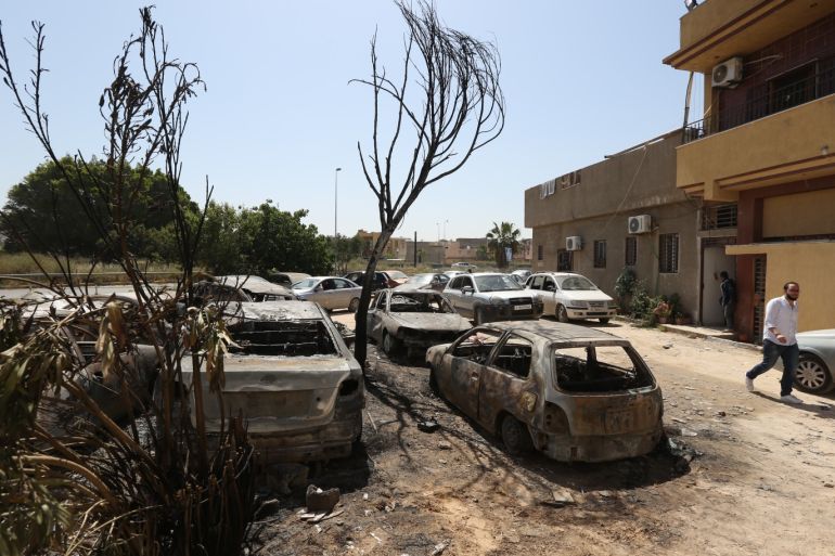 Trablus'a roket saldırısı- - TRIPOLI, LIBYA - APRIL 17: Damaged vehicles are seen after East Libya-based forces led by commander Khalifa Haftar carried out rocket attacks at the Abu Salim neighborhood in Tripoli, Libya on April 17, 2019.