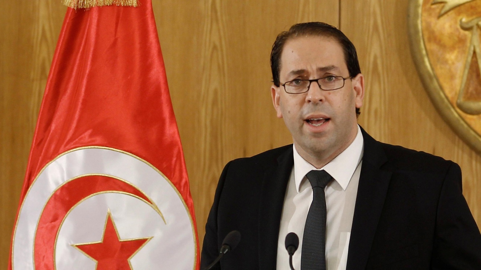 ‪الشاهد كان من قادة نداء تونس قبل تجميد عضويته‬  (رويترز)