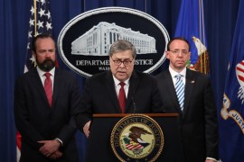 WASHINGTON, DC - APRIL 18: U.S. Attorney General William Barr speaks about the release of the redacted version of the Mueller report as U.S. Deputy Attorney General Rod Rosenstein (R) and U.S. Acting Principal Associate Deputy Attorney General Ed OCallaghan listen at the Department of Justice April 18, 2019 in Washington, DC. Members of Congress are expected to receive copies of the report later this morning with the report being released publicly soon after. Win McNamee/Getty Images/AFP== FOR NEWSPAPERS, INTERNET, TELCOS & TELEVISION USE ONLY ==