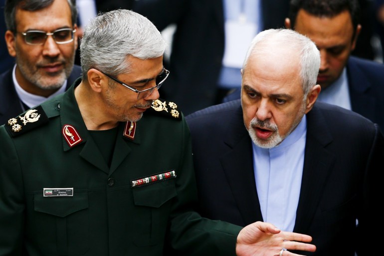 Trilateral summit on Syria in Russia- - SOCHI, RUSSIA - FEBRUARY 14: General Staff of the Armed Forces of Iran, Mohammad Bagheri (L) and Iranian Foreign Minister Mohammad Javad Zarif (R) attend the 4th trilateral summit on Syria on February 14, 2019 in Sochi, Russia.