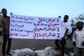 Demonstrations in Sudan- - KHARTOUM, SUDAN - APRIL 16: Sudanese demonstrators hold a banner in front of military headquarters during a demonstration demanding a civilian transition government, in Khartoum, Sudan on April 16, 2019.