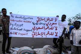 Demonstrations in Sudan- - KHARTOUM, SUDAN - APRIL 16: Sudanese demonstrators hold a banner in front of military headquarters during a demonstration demanding a civilian transition government, in Khartoum, Sudan on April 16, 2019.