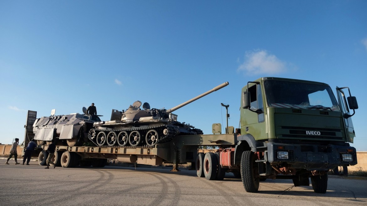 Libyan National Army (LNA) members, commanded by Khalifa Haftar, equip the military vehicles to get out of Benghazi to reinforce the troops advancing to Tripoli, in Benghazi, Libya April 13, 2019. REUTERS/Esam Omran Al-Fetori
