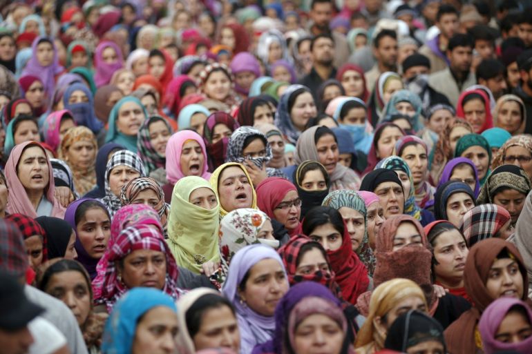 Kashmiri women attend the funeral prayers of Sajad Ahmad Bhat, a suspected militant, on the outskirts of Srinagar, January 12, 2016. Clashes between the protesters and Indian police broke out on Tuesday after the demonstrators tried to march towards the Srinagar-Jammu national highway during the funeral of Bhat, a suspected militant of Pakistan-based Lashkar-e-Taiba (LeT) group, who was killed in a gunfight last night with Indian security forces, local media reported. REUTERS/Danish Ismail