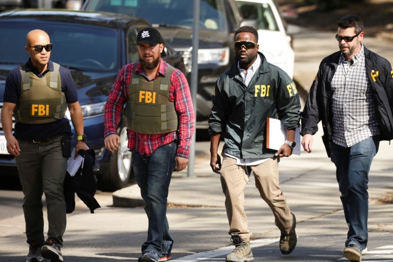 FBI agents are seen near Youtube headquarters following an active shooter situation in San Bruno, California, U.S., April 3, 2018. REUTERS/Elijah Nouvelage