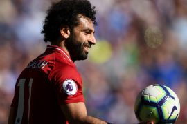 CARDIFF, WALES - APRIL 21: Liverpool player Mohamed Salah holds up the match ball whilst raising a smile during the Premier League match between Cardiff City and Liverpool FC at Cardiff City Stadium on April 21, 2019 in Cardiff, United Kingdom. (Photo by Stu Forster/Getty Images)