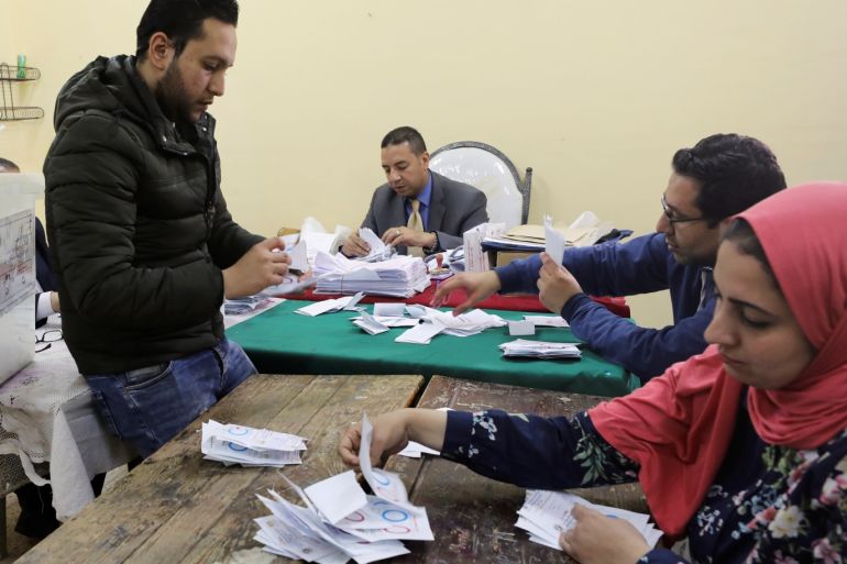 Officials count ballots on the final day of the referendum on draft constitutional amendments, in Cairo, Egypt April 22, 2019. REUTERS/Mohamed Abd El Ghany