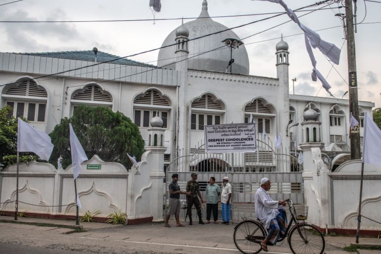 NEGOMBO, SRI LANKA - APRIL 25: A man cycles past a mosque that had been used as a shelter by Muslims fearing reprisals following the Easter Sunday attacks on churches and hotels, on April 25, 2019 in Negombo, Sri Lanka. At least 359 people were killed and 500 people injured after coordinated attacks on churches and hotels on Easter Sunday which rocked three churches and three luxury hotels in and around Colombo as well as at Batticaloa in Sri Lanka. According to reports