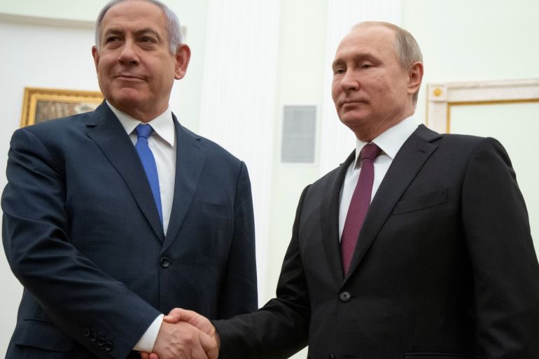 Russian President Vladimir Putin, shakes hands with Israeli Prime Minister Benjamin Netanyahu, during their meeting in the Kremlin in Moscow, Russia, April 4, 2019. Alexander Zemlianichenko/Pool via REUTERS