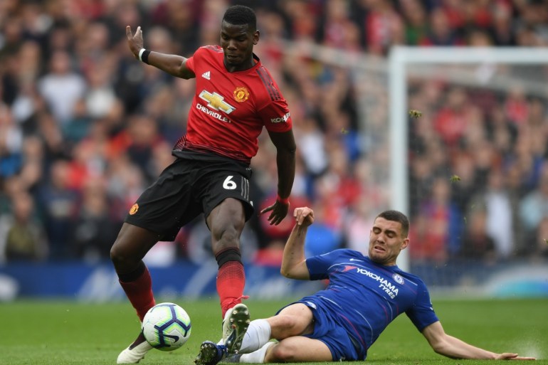 MANCHESTER, ENGLAND - APRIL 28: Paul Pogba of Manchester United is challenged by Mateo Kovacic of Chelseaduring the Premier League match between Manchester United and Chelsea FC at Old Trafford on April 28, 2019 in Manchester, United Kingdom. (Photo by Shaun Botterill/Getty Images)