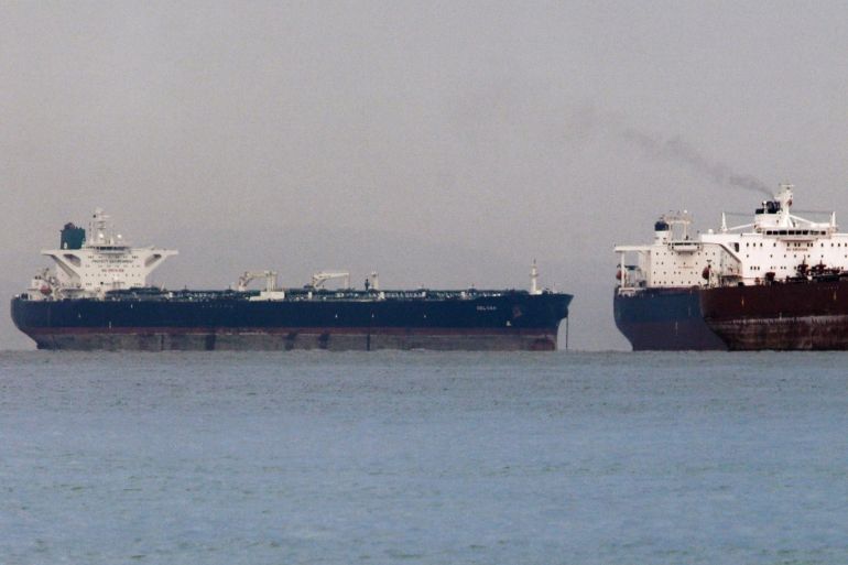 Vessels sail past Malta-flagged Iranian crude oil supertanker