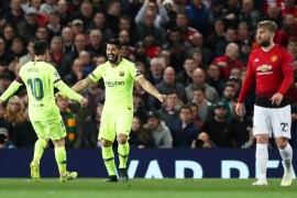 Soccer Football - Champions League Quarter Final First Leg - Manchester United v FC Barcelona - Old Trafford, Manchester, Britain - April 10, 2019 Barcelona's Luis Suarez celebrates scoring their first goal with Lionel Messi and Manchester United's Luke Shaw reacts Action Images via Reuters/Lee Smith