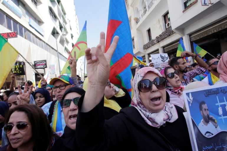 A woman shouts slogans during a demonstration against the Moroccan court, after the jailing of Moroccan activist and the leader of the