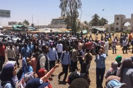 Demonstrations in Sudan- - KHARTOUM, SUDAN - APRIL 8: Sudanese protesters, demanding the resignation of Sudanese President Omar Al-Bashir, stage a demonstration against high cost of living, fuel and cash shortage in front of army headquarters building in Khartoum, Sudan on April 8, 2019.