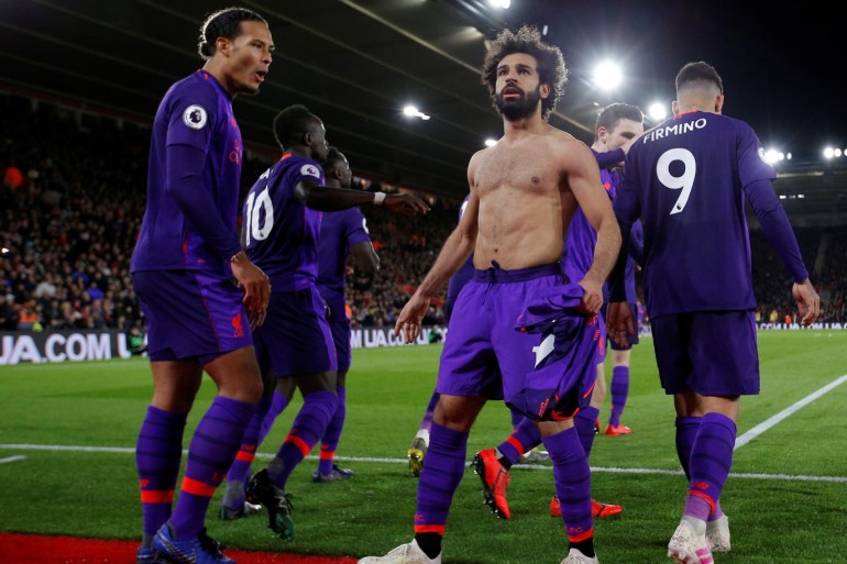 Soccer Football - Premier League - Southampton v Liverpool - St Mary's Stadium, Southampton, Britain - April 5, 2019 Liverpool's Mohamed Salah celebrates scoring their second goal with team mates Action Images via Reuters/Andrew Couldridge EDITORIAL USE ONLY. No use with unauthorized audio, video, data, fixture lists, club/league logos or
