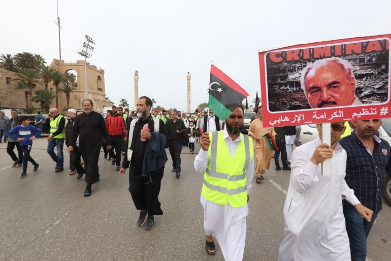 Protest in Libyan capital- - TRIPOLI, LIBYA - APRIL 26 : Libyans, some wearing yellow vests, protest against Khalifa Haftar, who commands forces loyal to Libya’s eastern government and launches campaign to capture capital Tripoli, on April 26, 2019 in the Libyan capital Tripoli's Martyrs' Square.