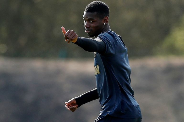 Soccer Football - Champions League - Manchester United Training - Aon Training Complex, Manchester, Britain - April 9, 2019 Manchester United's Paul Pogba during training Action Images via Reuters/Lee Smith