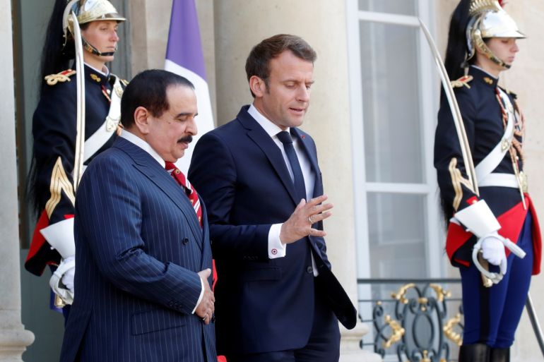 French President Emmanuel Macron accompanies King Hamad bin Isa Al Khalifa of Bahrain after a meeting at the Elysee Palace in Paris, France, April 30, 2019. REUTERS/Philippe Wojazer