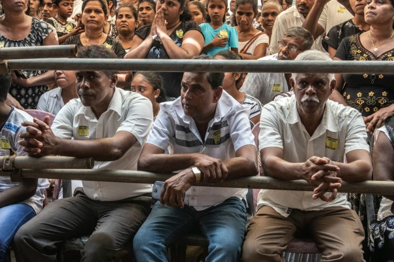 NEGOMBO, SRI LANKA - APRIL 23: People attend a mass funeral at St Sebastian Church on April 23, 2019 in Negombo, Sri Lanka. At least 311 people were killed with hundreds more injured after coordinated attacks on churches and hotels on Easter Sunday rocked three churches and three luxury hotels in and around Colombo as well as at Batticaloa in Sri Lanka. Sri Lankan authorities declared a state of emergency on Monday as police arrested 24 people so far in connection with the suicide bombs, which injured at least 500 people as the blasts took place at churches in Colombo city as well as neighboring towns and hotels, including the Shangri-La, Kingsbury and Cinnamon Grand. (Photo by Carl Court/Getty Images)