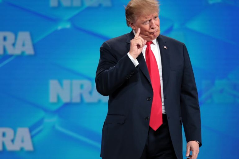 INDIANAPOLIS, INDIANA - APRIL 26: U.S. President Donald Trump gestures to the crowd at the NRA-ILA Leadership Forum at the 148th NRA Annual Meetings & Exhibits on April 26, 2019 in Indianapolis, Indiana. The convention, which runs through Sunday, features more than 800 exhibitors and is expected to draw 80,000 guests. Scott Olson/Getty Images/AFP== FOR NEWSPAPERS, INTERNET, TELCOS & TELEVISION USE ONLY ==